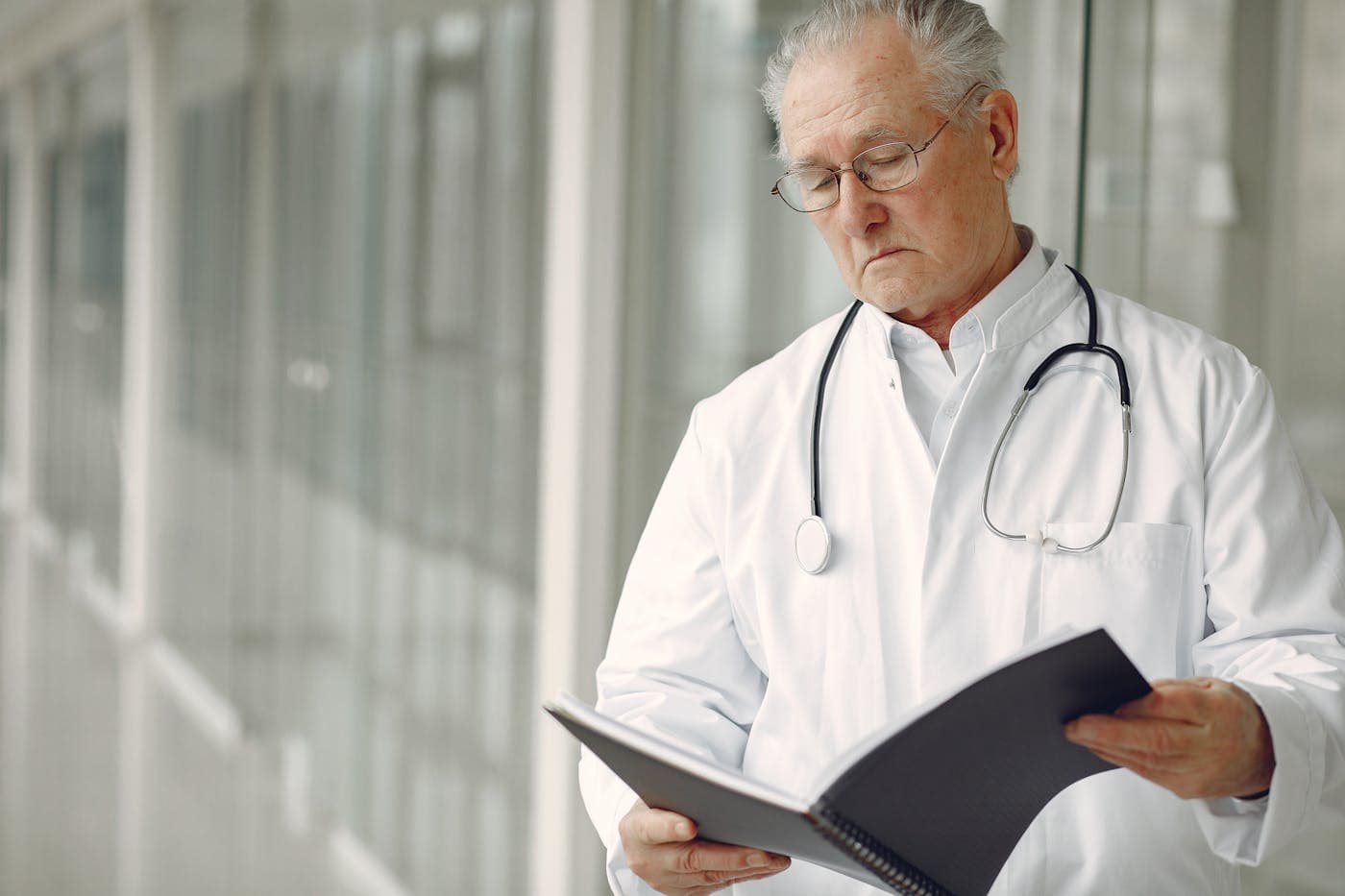 Healthcare professionals in conversation about clinical operations.